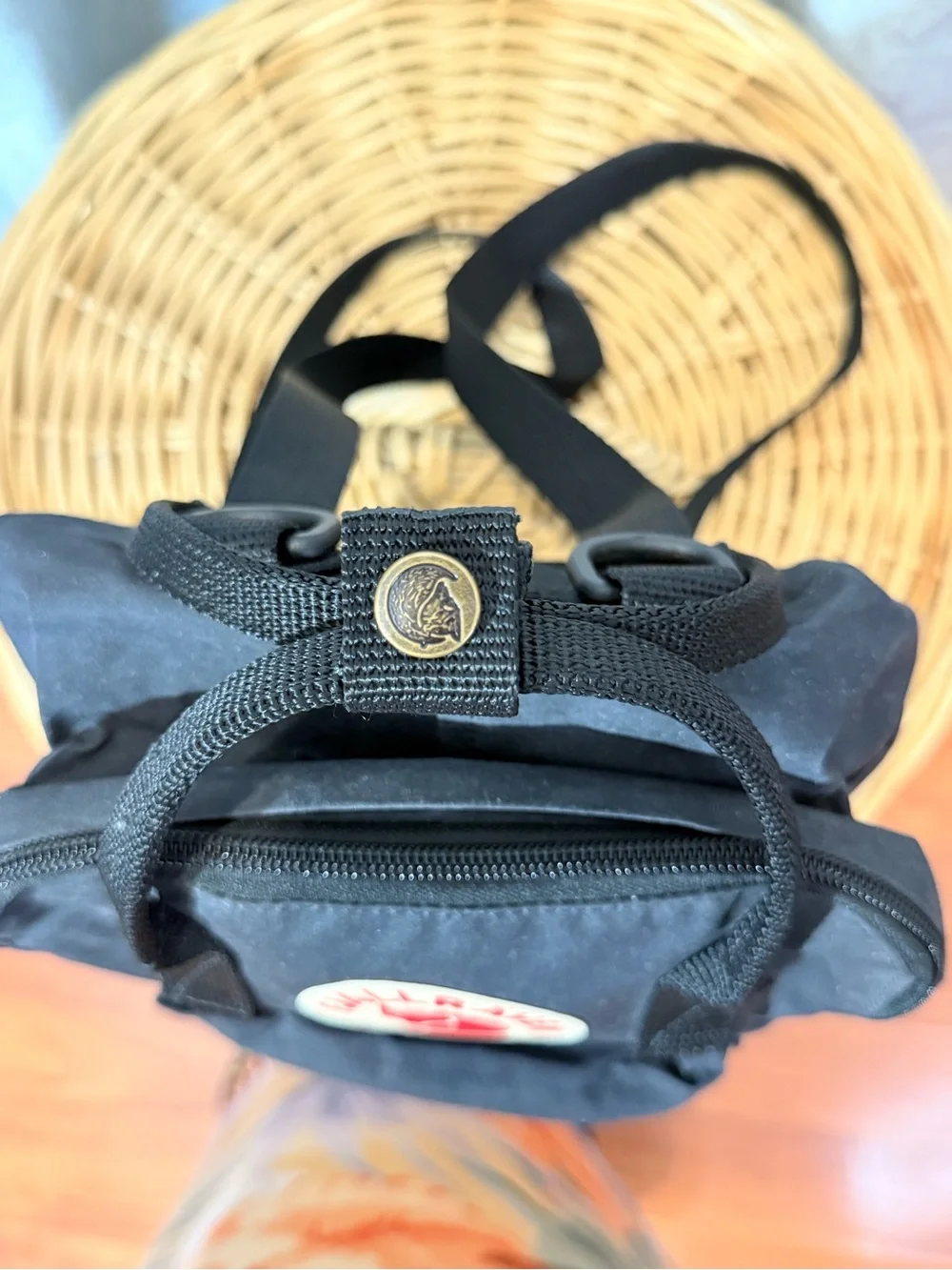 Fjallraven Kanken Mini Backpack in Black with Red Logo